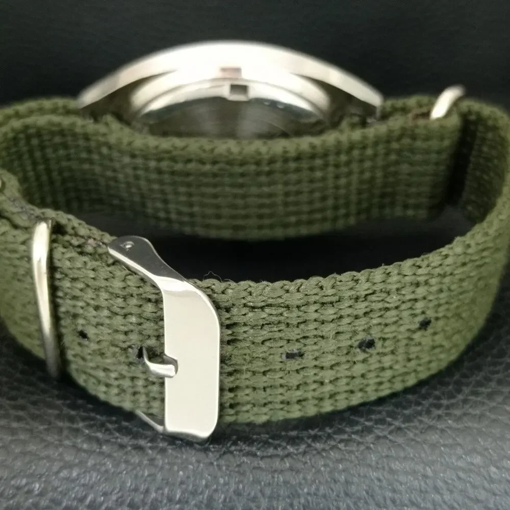 Vintage 1977 HMT Manual Wound Mens Silver Watch & Green accents